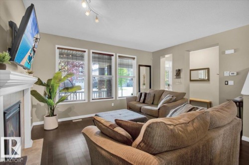 625 Allard Boulevard, Edmonton, AB - Indoor Photo Showing Living Room With Fireplace