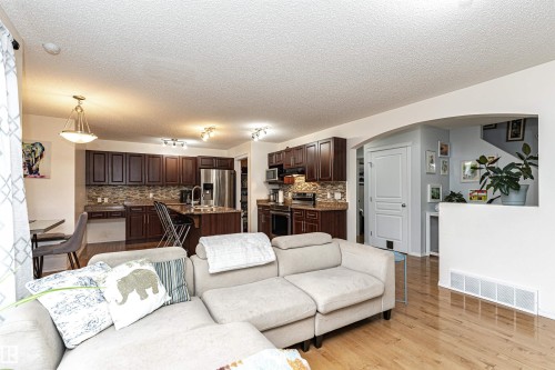 38 Rue Bouchard, Beaumont, AB - Indoor Photo Showing Living Room