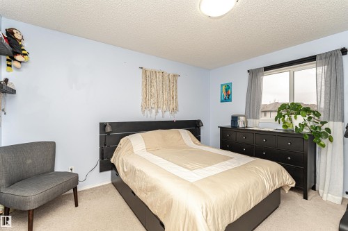 38 Rue Bouchard, Beaumont, AB - Indoor Photo Showing Bedroom