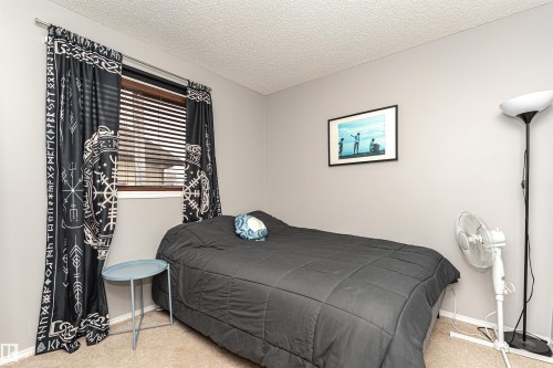 38 Rue Bouchard, Beaumont, AB - Indoor Photo Showing Bedroom