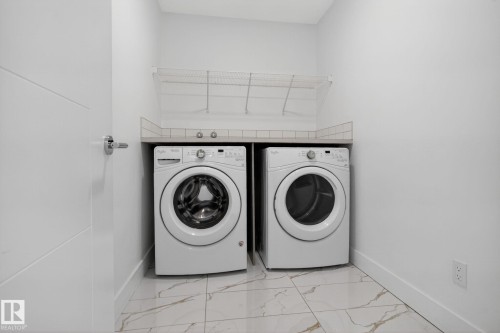 1096 Secord Promenade, Edmonton, AB - Indoor Photo Showing Laundry Room