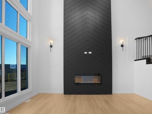 955 Elderberry Landing, Edmonton, AB - Indoor Photo Showing Other Room With Fireplace