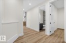Hallway featuring light wood-style floors and recessed lighting - 8450 Mayday Link, Edmonton, AB  - Indoor Photo Showing Other Room 
