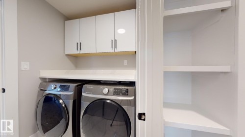 8450 Mayday Link, Edmonton, AB - Indoor Photo Showing Laundry Room