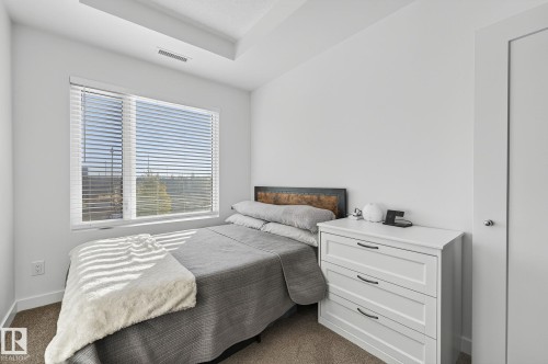 218 1316 Windermere Way, Edmonton, AB - Indoor Photo Showing Bedroom