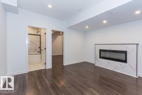 9740 152 Street, Edmonton, AB - Indoor Photo Showing Living Room With Fireplace