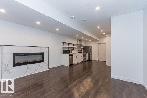 9740 152 Street, Edmonton, AB - Indoor Photo Showing Living Room With Fireplace