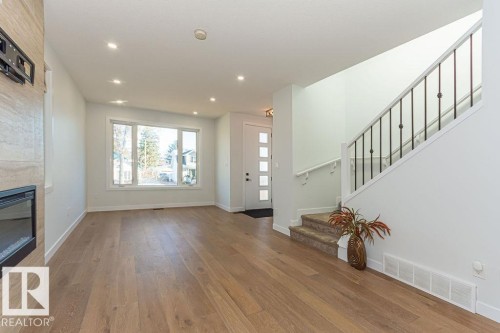 9740 152 Street, Edmonton, AB - Indoor Photo Showing Other Room With Fireplace