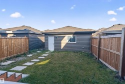 Back of house featuring a fenced backyard - 