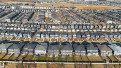 Aerial overview of property's location featuring nearby suburban area - 