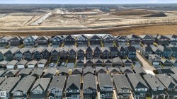 Aerial view of property and surrounding area with nearby suburban area - 