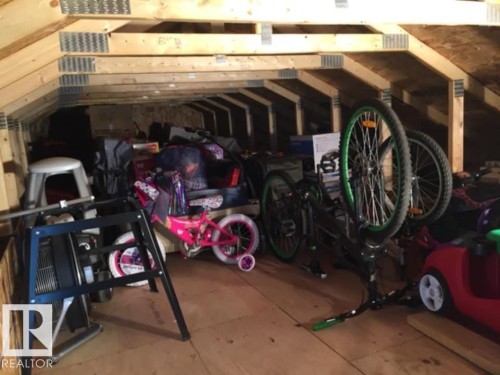 656 Songhurst Wynd, Leduc, AB - Indoor Photo Showing Garage