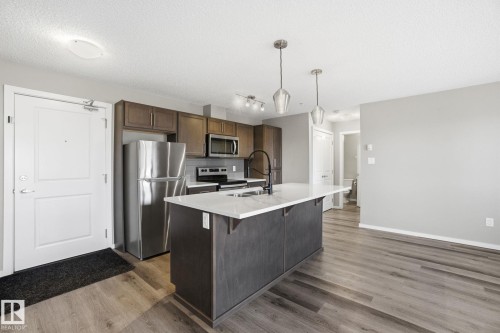 126 148 Ebbers Boulevard, Edmonton, AB - Indoor Photo Showing Kitchen With Double Sink With Upgraded Kitchen
