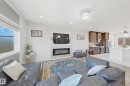 2 2803 14 Avenue, Edmonton, AB  - Indoor Photo Showing Living Room With Fireplace 