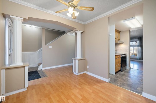 163 Abbottsfield Road Nw, Edmonton, AB - Indoor Photo Showing Other Room With Fireplace