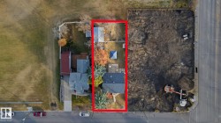 Aerial view of property's location featuring property parcel outlined - 