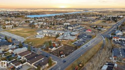 Aerial overview of property's location with a large body of water - 