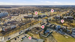 Aerial overview of property's location with nearby suburban area - 