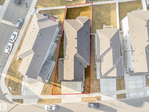 Aerial view of residential area with property parcel outlined - 2412 14 Avenue, Edmonton, AB - 