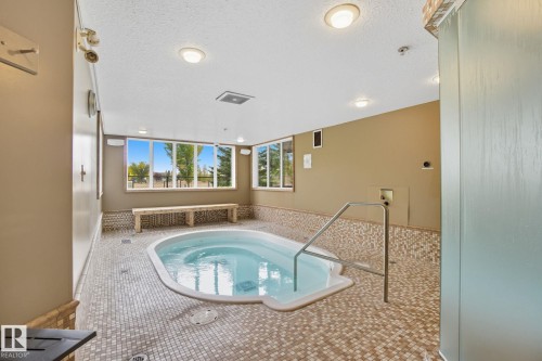 412 278 Suder Greens Drive, Edmonton, AB - Indoor Photo Showing Other Room With In Ground Pool