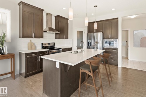 5404 22 Avenue, Edmonton, AB - Indoor Photo Showing Kitchen With Stainless Steel Kitchen With Double Sink With Upgraded Kitchen