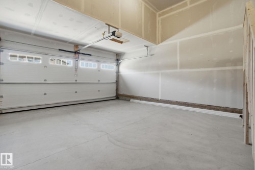 7104 47A Street, Beaumont, AB - Indoor Photo Showing Garage