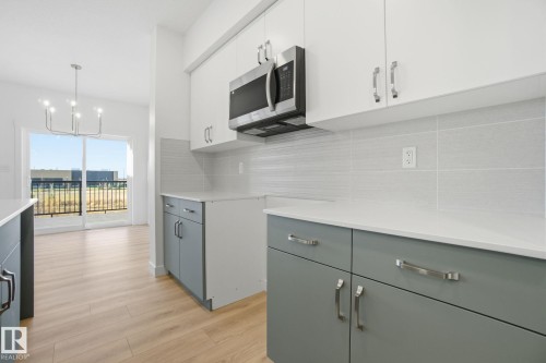 7104 47A Street, Beaumont, AB - Indoor Photo Showing Kitchen