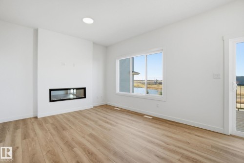 7104 47A Street, Beaumont, AB - Indoor With Fireplace