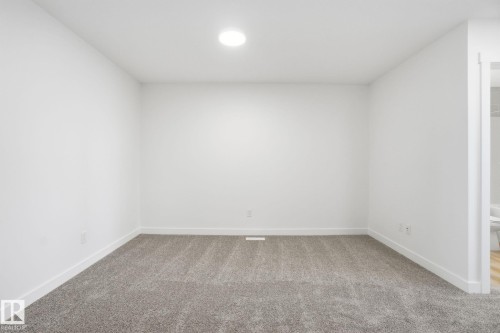 7104 47A Street, Beaumont, AB - Indoor Photo Showing Other Room