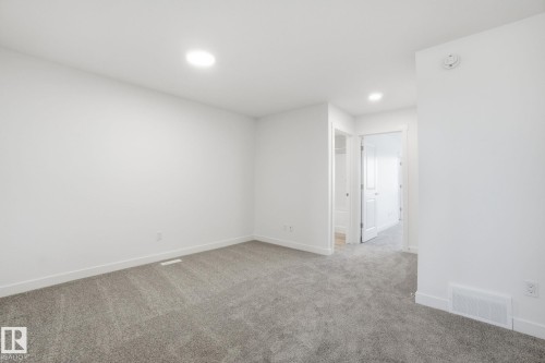 7104 47A Street, Beaumont, AB - Indoor Photo Showing Other Room