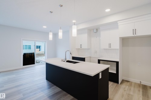 362 Bluff Cove, Leduc, AB - Indoor Photo Showing Kitchen With Double Sink