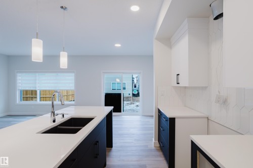362 Bluff Cove, Leduc, AB - Indoor Photo Showing Kitchen With Double Sink