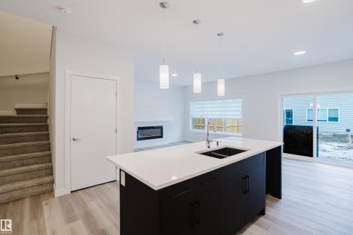 362 Bluff Cove, Leduc, AB - Indoor Photo Showing Kitchen With Double Sink