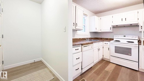 10427 24 Avenue, Edmonton, AB - Indoor Photo Showing Kitchen With Double Sink