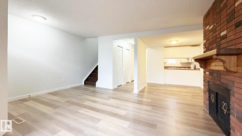 10427 24 Avenue, Edmonton, AB - Indoor With Fireplace
