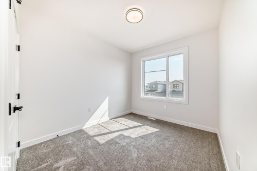 14 Tenuto Link, Spruce Grove, AB - Indoor Photo Showing Other Room