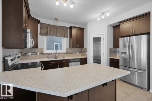 2223 76 Street, Edmonton, AB - Indoor Photo Showing Kitchen With Double Sink With Upgraded Kitchen