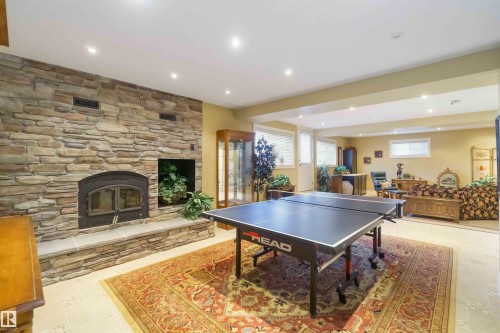 50344 Rge Rd 243, Rural Leduc County, AB - Indoor Photo Showing Other Room With Fireplace