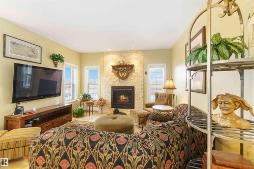 50344 Rge Rd 243, Rural Leduc County, AB - Indoor Photo Showing Living Room With Fireplace