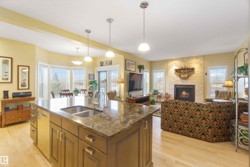 50344 Rge Rd 243, Rural Leduc County, AB - Indoor Photo Showing Kitchen With Fireplace With Double Sink