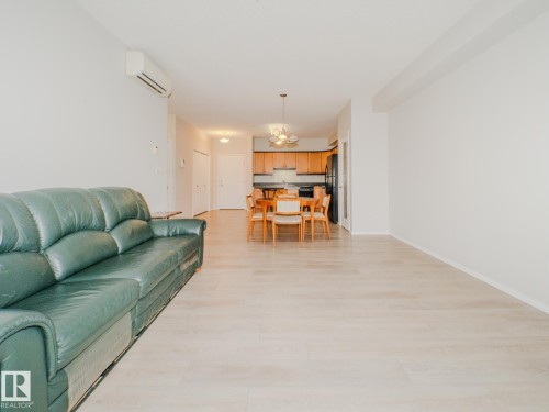 209 12111 51 Avenue, Edmonton, AB - Indoor Photo Showing Living Room