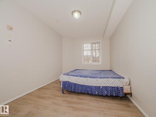 209 12111 51 Avenue, Edmonton, AB - Indoor Photo Showing Bedroom