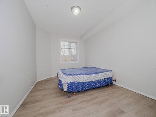 209 12111 51 Avenue, Edmonton, AB - Indoor Photo Showing Bedroom