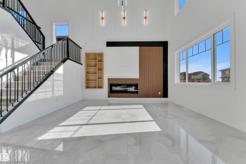 4008 40 Street, Beaumont, AB - Indoor Photo Showing Other Room With Fireplace