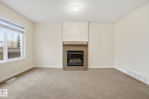 5324 165 Avenue, Edmonton, AB - Indoor Photo Showing Living Room With Fireplace