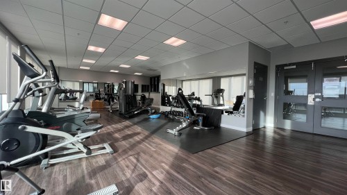 1225 5151 Windermere Boulevard, Edmonton, AB - Indoor Photo Showing Gym Room