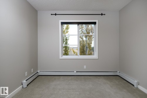 406 1144 Adamson Drive, Edmonton, AB - Indoor Photo Showing Other Room