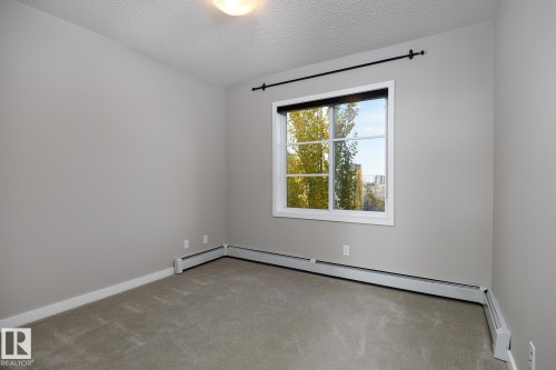 406 1144 Adamson Drive, Edmonton, AB - Indoor Photo Showing Other Room