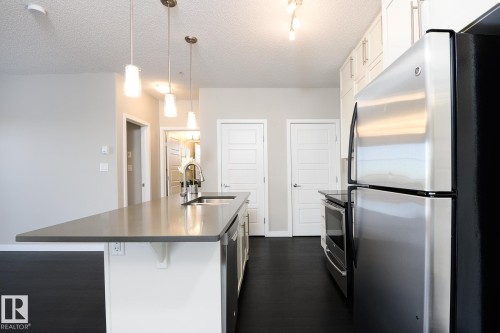 406 1144 Adamson Drive, Edmonton, AB - Indoor Photo Showing Kitchen With Stainless Steel Kitchen