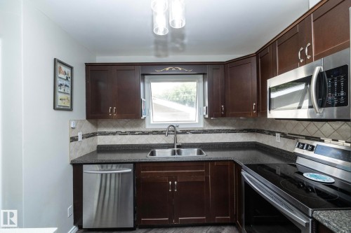 3418 120 Avenue, Edmonton, AB - Indoor Photo Showing Kitchen With Double Sink